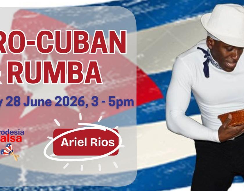 Cuban guy dancing with a cuban flag in the background