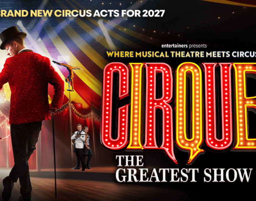 Ringmaster in a black top hat alonside Cirque logo