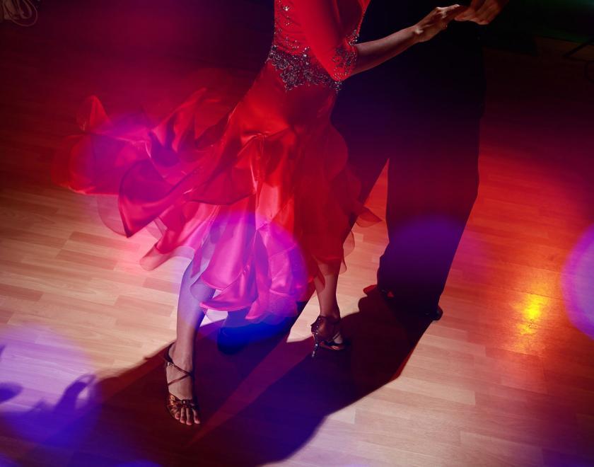 Male and female dancers on a dancefloor