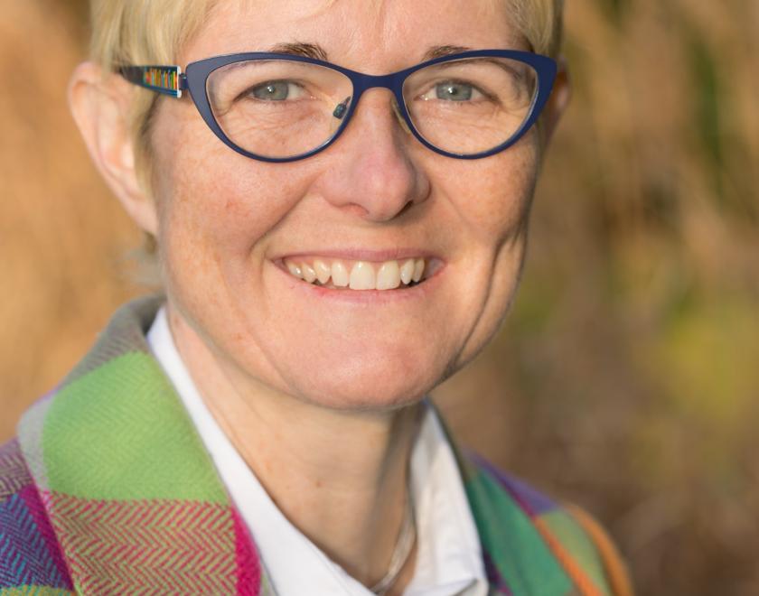 Picture of Fiona Barker head and shoulders in a colourful coat