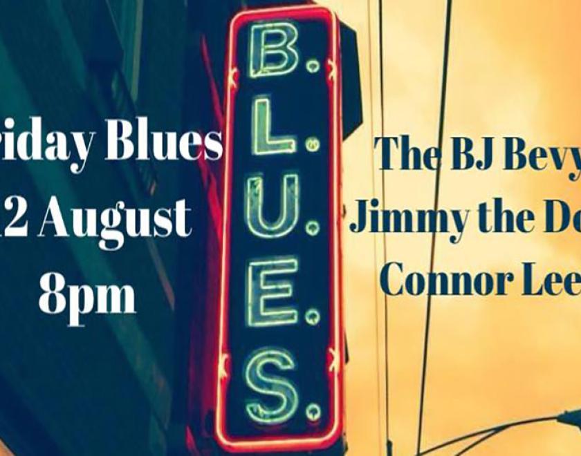 Image of a neaon sign spelling the word BLUES