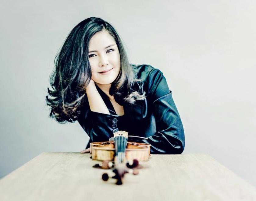 Hyeyoon with her violin on table in front