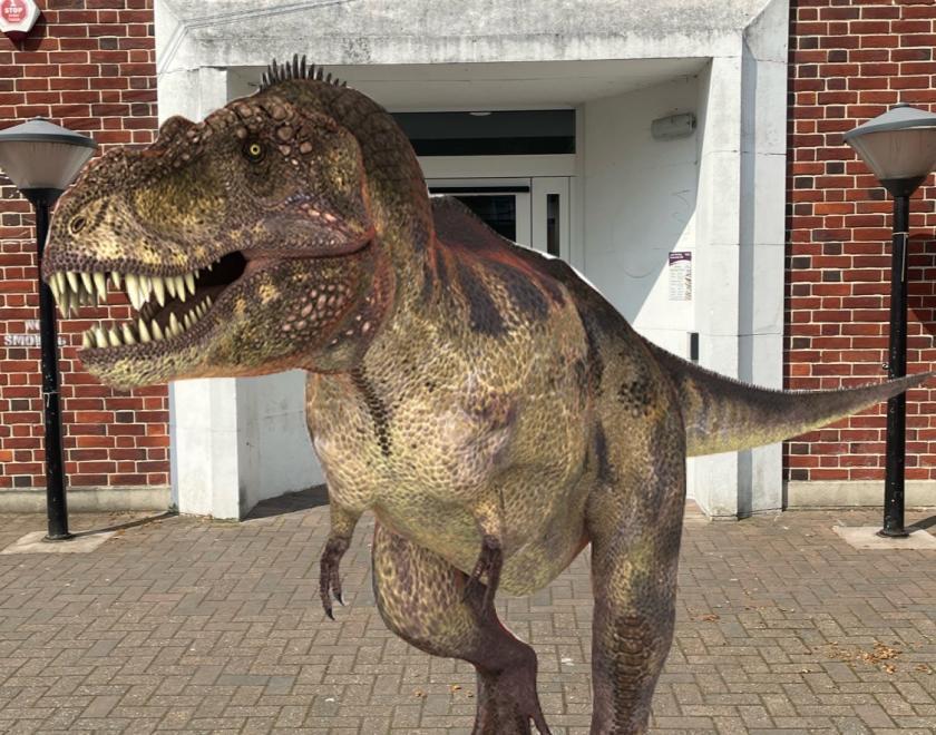 Dinosaur in front of Whitley Library