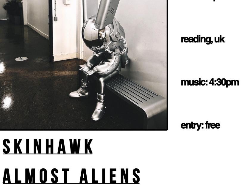 Black, silver and white poster. A silverish cyborg type creature sits leant forward on a metal bench in an industrial corridor