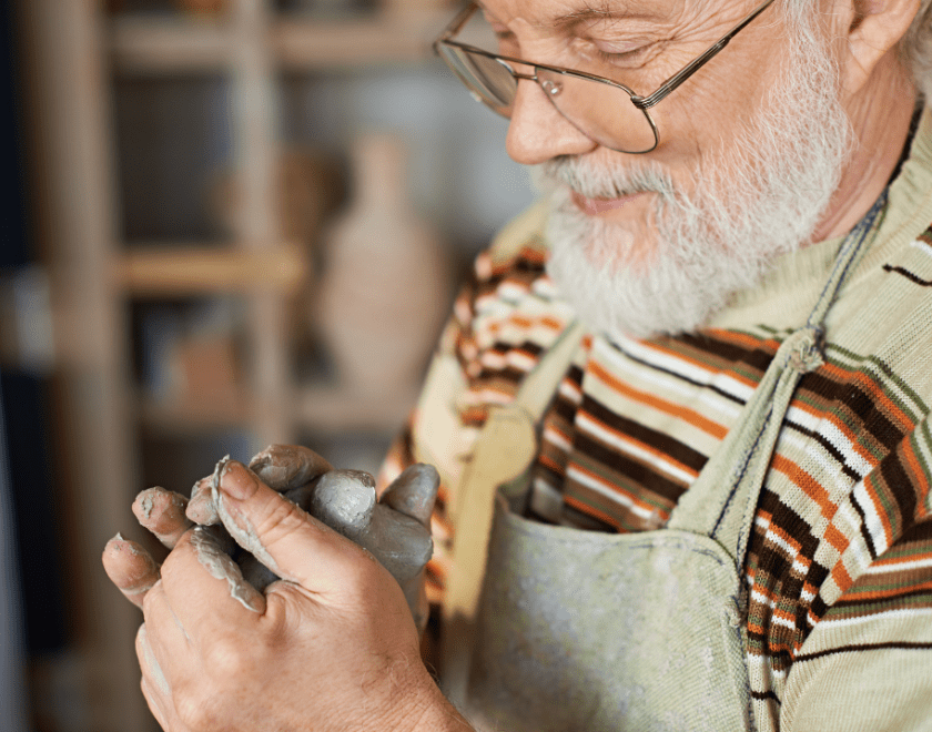 Man working with clay