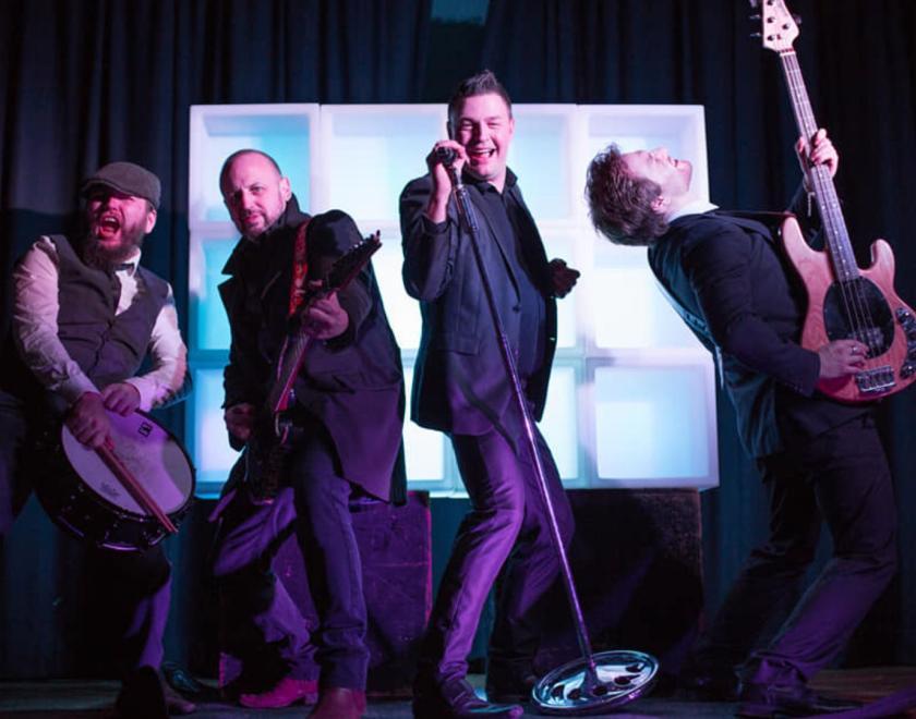 A group photo of the Ultimate Party Band.