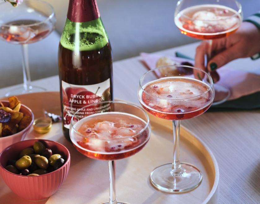 Tray of drinks with the IKEA Sparkling lingonberry drink
