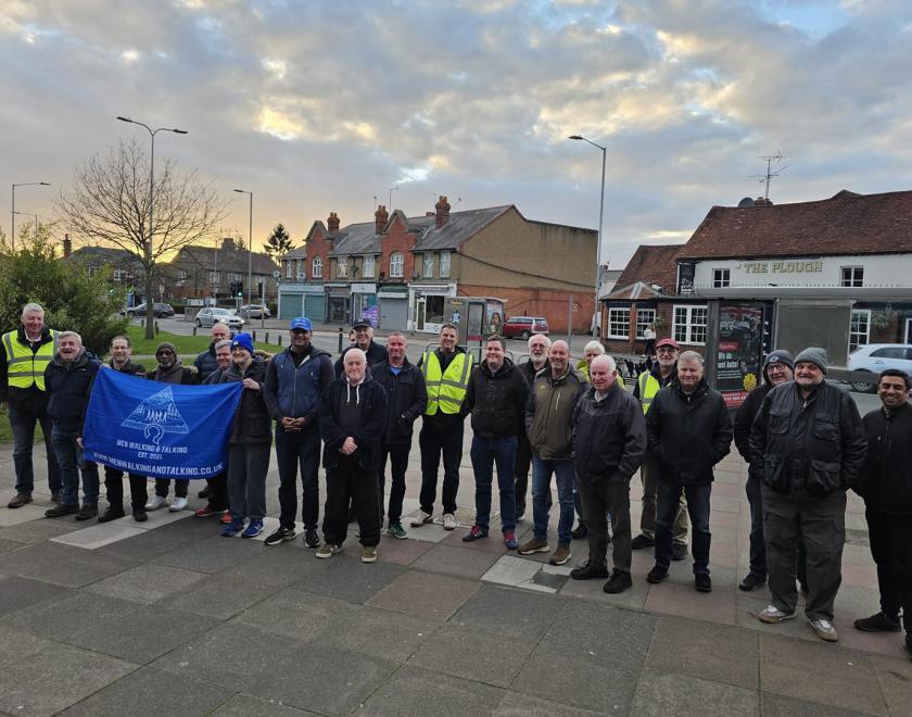 Members of Reading Men Walking and Talking (MWAT) group standing in a line