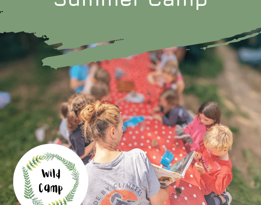 children sitting at a table at summer camp