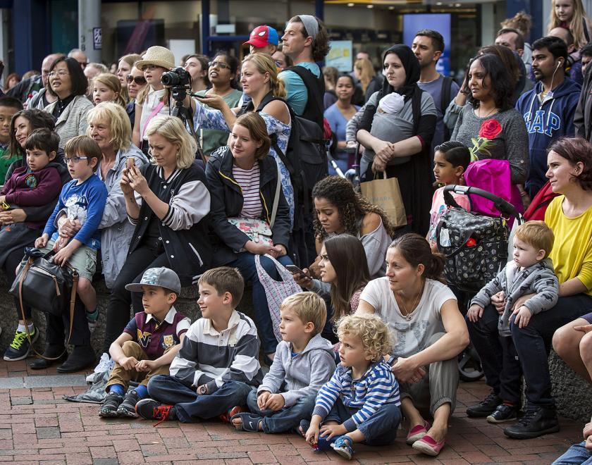 Crowd enjoying street performance in Reading