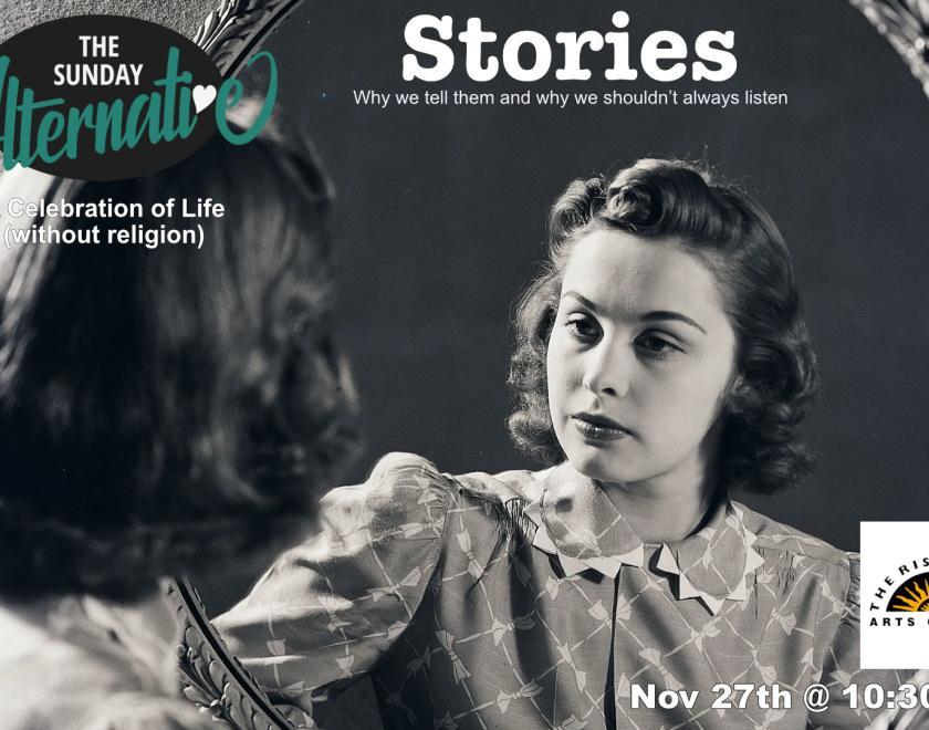 Women looking thoughtfully into a large mirror