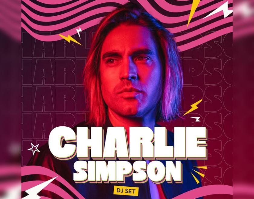 Charlie Simpson against a multicoloured background