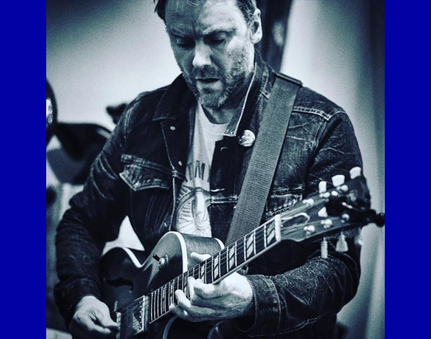 Hugh Turner playing guitar