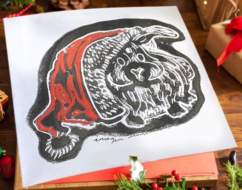 Rabbit with Christmas hat made with linoleum