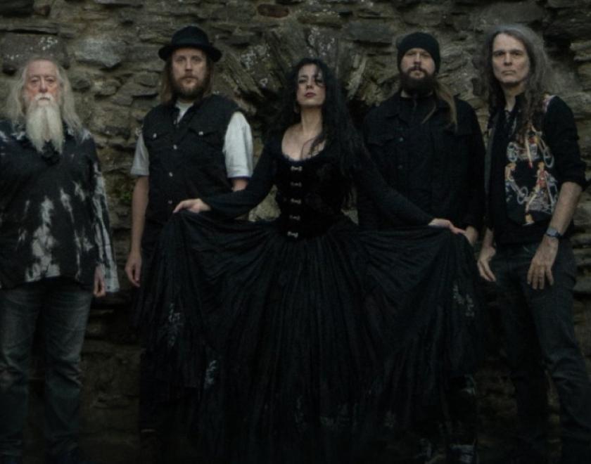 Night-ish - Nightwish Tribute Band standing against a castle wall