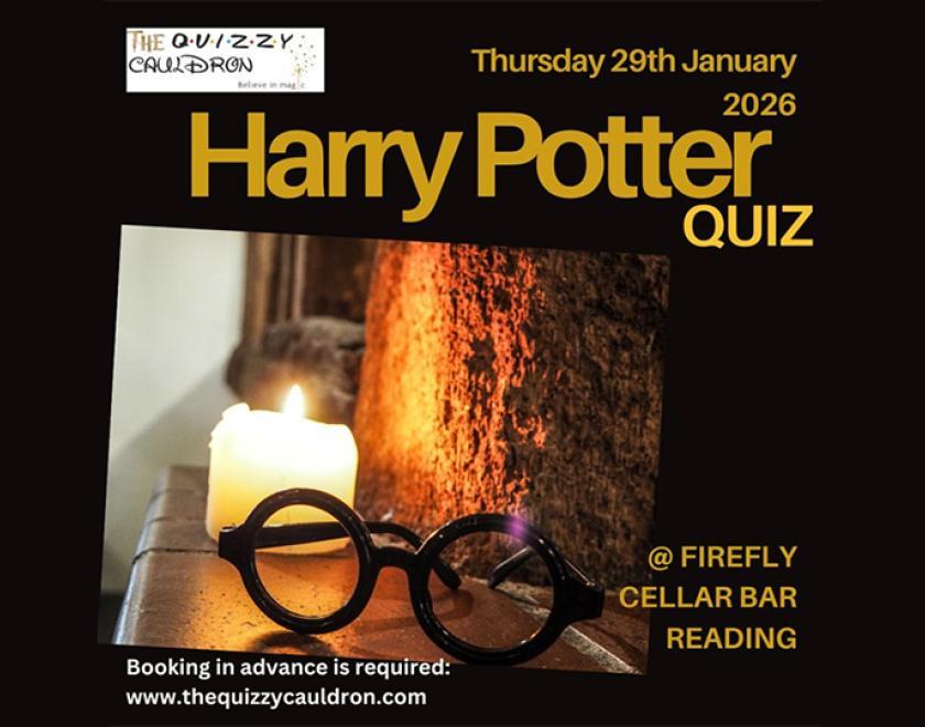 Poster featuring a close-up of a pair of round glassess near a candle