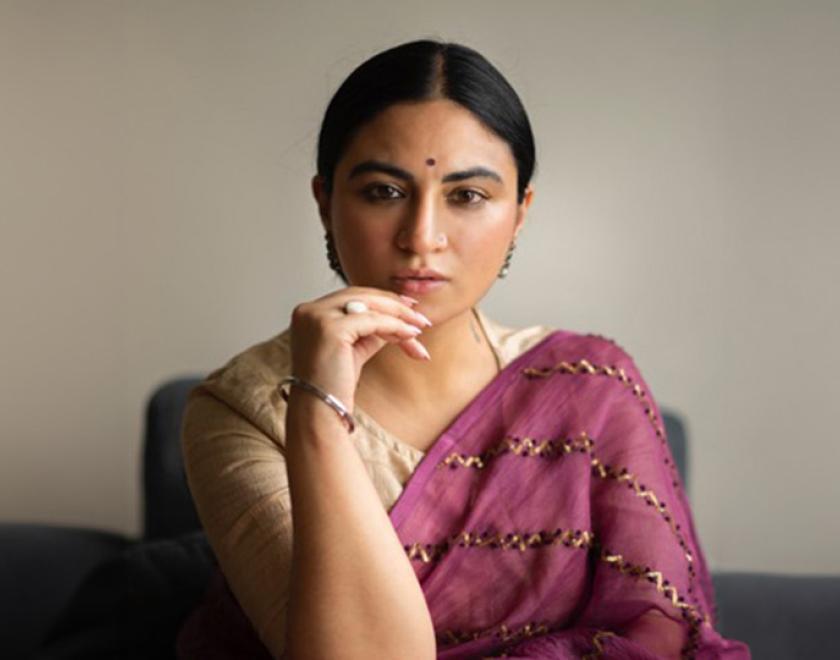 Priya Malik, wearing traditional Indian costume