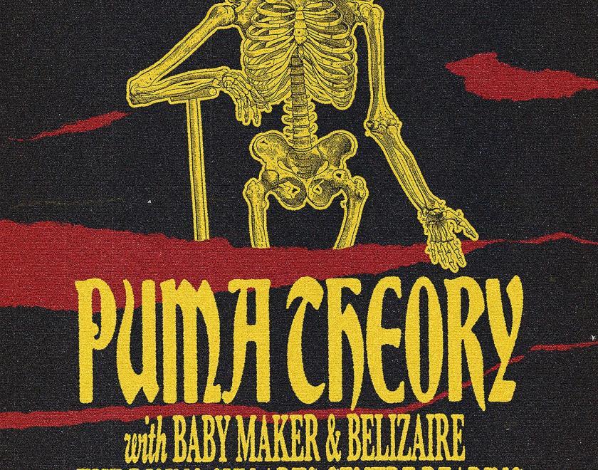 Poster for Puma Theory Halloween Show with a drawing of a yellow skeleton against a black and red background