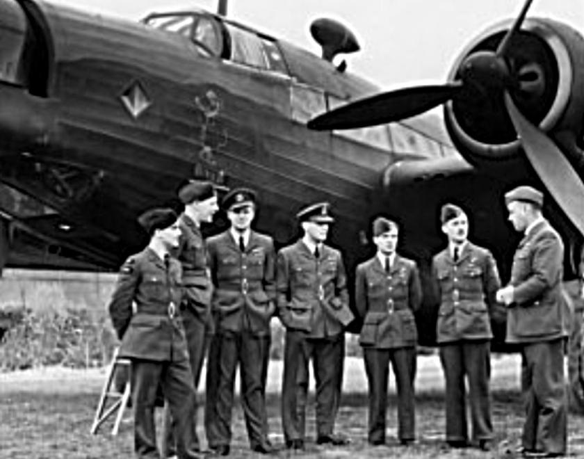 RAF men in front of their plane in World War Two