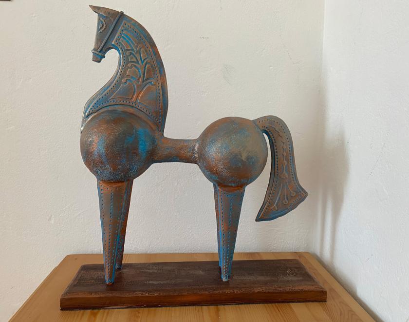 Copper-effect horse sculpture