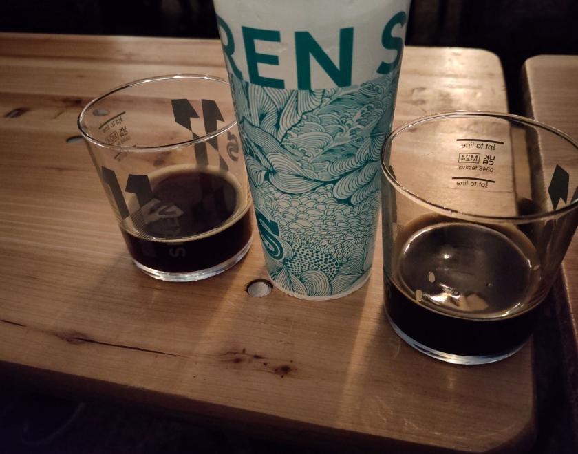 2 dark beers in Siren times 11 half-pint  glasses and a Siren plastic pint glass