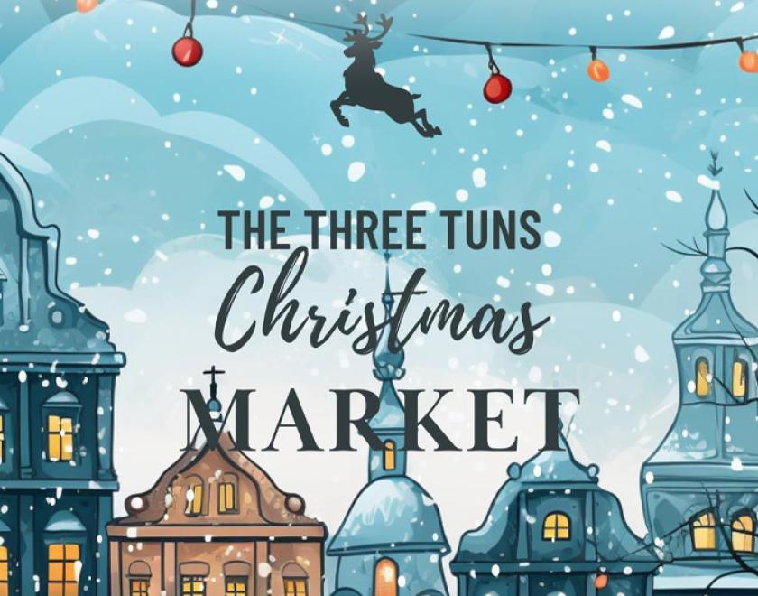 Three Tuns Christmas Market poster with a reindeer flying over a snowy skyline