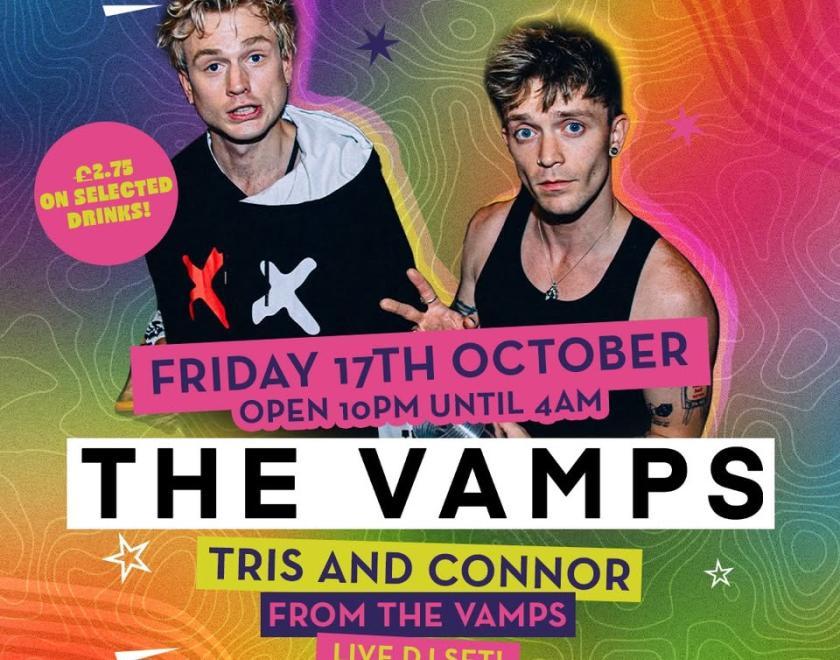 Photo of Tris and Connor from the Vamps - two skinny thirty-something lads in dark clothes and eyeliner
