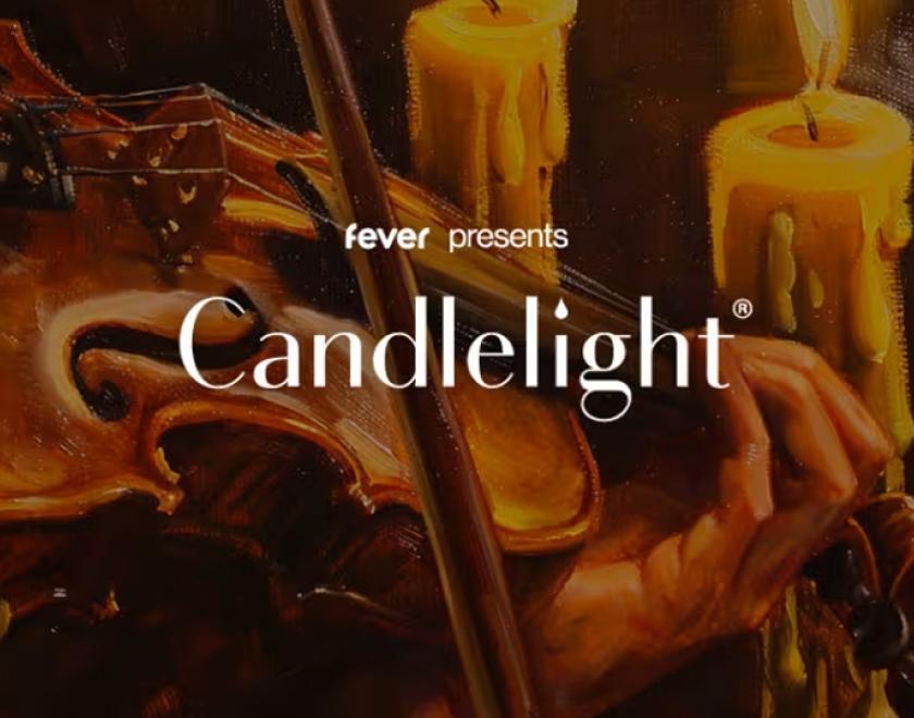 The words "fever presents Candlelight" over a close up painting of a man playing a violin