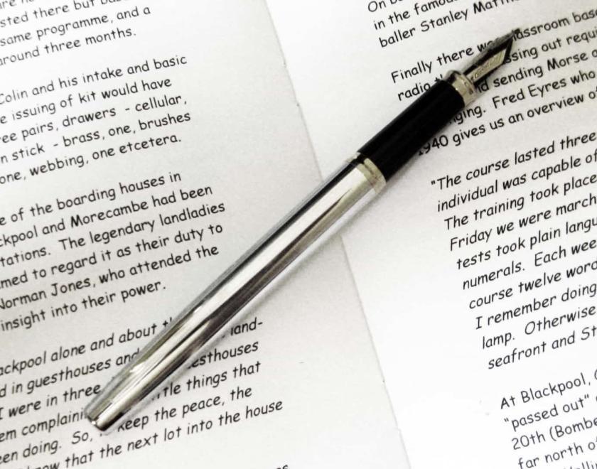 A family history book and fountain pen